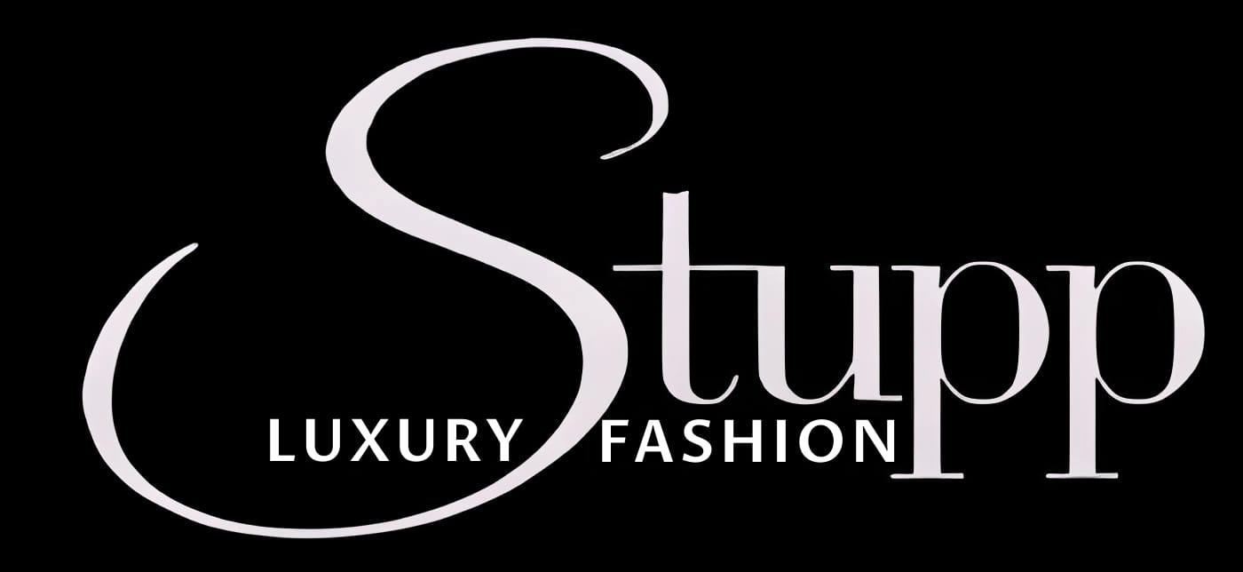 Stupp Luxury Fashion logo featuring 'Stupp' in a large, stylized script font, with 'LUXURY FASHION' in smaller uppercase text below.
